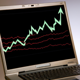 description (anonymous): an image depicting a laptop screen displaying a stock chart with upward trends, symbolizing the potential growth and returns of drip investing.