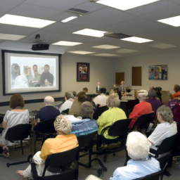 an image of a group of florida state employees gathered in a conference room, listening to a presentation about retirement planning options.