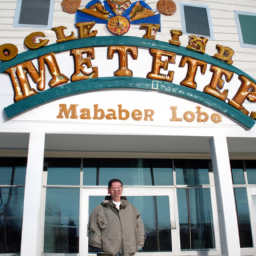 A photo of a person in front of the Maine Lottery headquarters.