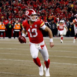 Description: A photo of Kansas City Chiefs quarterback Patrick Mahomes running with the ball in Super Bowl LVII.