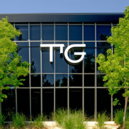 Description: An image of a modern office building with a glass exterior, with the TTJ Investment Group LLC logo visible on the entrance. The logo features the letters "TTJ" in bold black font, with "Investment Group LLC" in smaller font underneath. The building is surrounded by trees and greenery, suggesting a commitment to environmental sustainability.