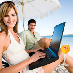 description: a couple sitting on a beach with a laptop and a cocktail, smiling and looking relaxed.