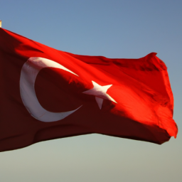 Description: A picture of the Turkish flag waving in the wind.