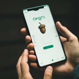 description: an anonymous image depicting a user navigating through the acorns app on a smartphone, showcasing the simplicity and convenience of the platform.