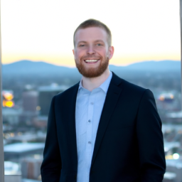 A picture of Daniel Tiemann in a business suit, smiling, with a background of a city skyline.